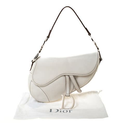 white and gold dior saddle bag|Dior white around world saddle bag.